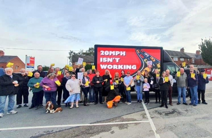 Sarah Atherton MP in front of the 20mph battle bus
