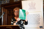 Sarah Atherton MP holding up report