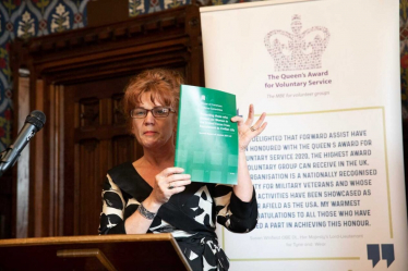 Sarah Atherton MP holding up report